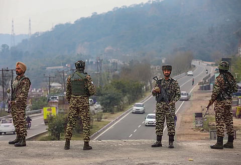 CRPF personnel stand guard near Jammu & Kashmir national highway, on the day of Prime Minister Narendra Modi's visit to Kashmir, in Jammu, Thursday, March 7, 2024.