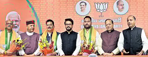 Independent MLAs join BJP in the presence of Union I&B Minister Anurag Thakur in New Delhi on Saturday.