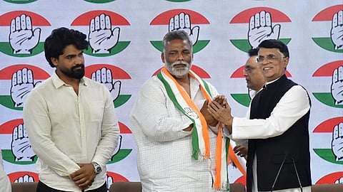 Jan Adhikar party President Pappu Yadav and his son Sarthak Ranjan join Congress in presence of Congress leader Pawan Khera at AICC Headquarters in New Delhi