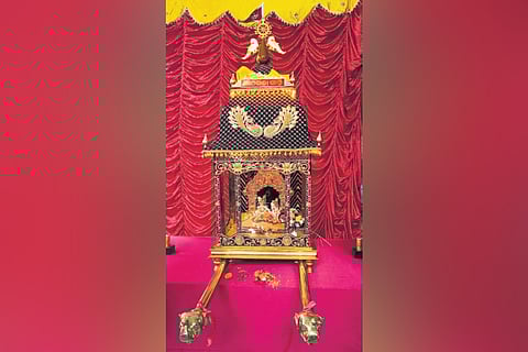 The palanquin made of gold displayed in front of Madan Mohan Jew Temple at Kathagada Sahi