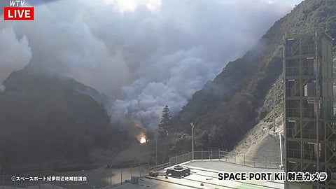 The image shows smoke and fire after a small rocket exploded after it was launched by Tokyo-based startup Space One, at the Spaceport Kii site in Kushimoto, Wakayama prefecture.