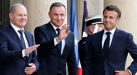 Left to right: Germany’s chancellor Olaf Scholz, Poland’s leader Andrzej Duda and Emmanuel Macron, president of France, at the Élysée Palace in Paris on Monday evening.