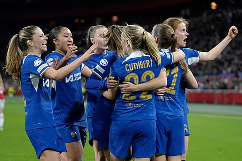Chelsea's Sjoeke Nuksen celebrates with teammates after scoring her side's second goal during the Women's Champions League quarterfinal soccer match between Ajax and Chelsea at the Johan Cruyff ArenA, in Amsterdam, Netherlands, Tuesday, March 19, 2024.