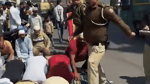In the video, cops were seen kicking men offering namaz.