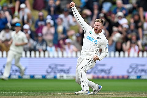 New Zealand bowler Glenn Phillips celebrates the wicket of Australia's Alex Carey on day three of the first Test match against Australia (Photo | AP)