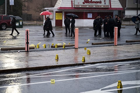 Evidence markers are seen following a shooting in Northeast Philadelphia.