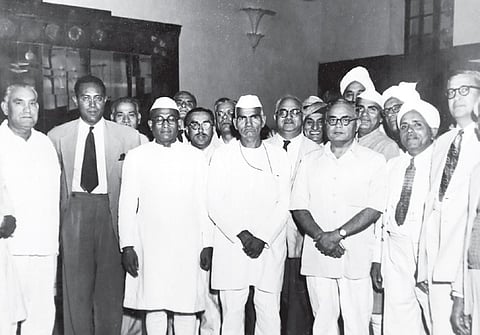 (Second from left) Lall attending an official meeting