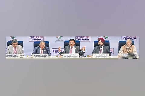 Chief Election Commissioner Rajiv Kumar with Election Commissioners Gyanesh Kumar and S S Sandhu annoucing the poll schedule in New Delhi on Saturday.