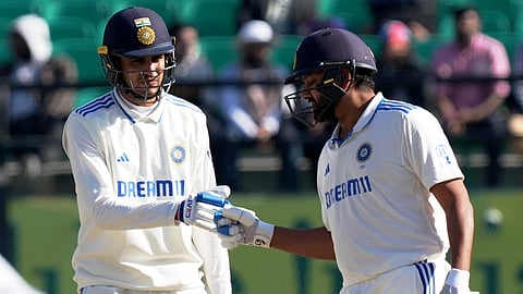 India's batters Rohit Sharma with Shubman Gill during the second day of the fifth Test cricket match between India and England, in Dharamsala, Friday, March 8, 2024.