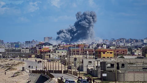 Smoke rises following an Israeli airstrike in the central Gaza Strip
