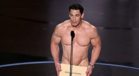 Wrestler-turned-actor John Cena appeared naked while presenting the award for best costume design to 'Poor Things'.
