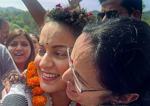 BJP candidate actor Kangana Ranaut during a roadshow ahead of Lok Sabha elections, in Mandi, March 29, 2024.
