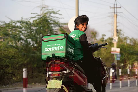A delivery partner of Zomato's new Pure Veg fleet