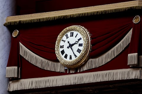 This photograph shows a clock during a session of questions to the government at the National Assembly in Paris on March 27, 2024.