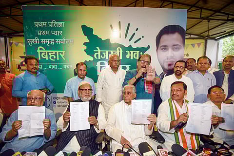 Bihar RJD President Jagdanand Singh and State Congress President Akhilesh Singh with CPI-ML, CPM and other leaders release Grand Alliance candidates' list for Lok Sabha elections, in Patna, Friday, March 29, 2024.