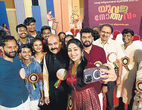 Actor Navya Nair clicks a selfie during the inauguration of the Kerala University Youth Festival in Thiruvananthapuram on Thursday