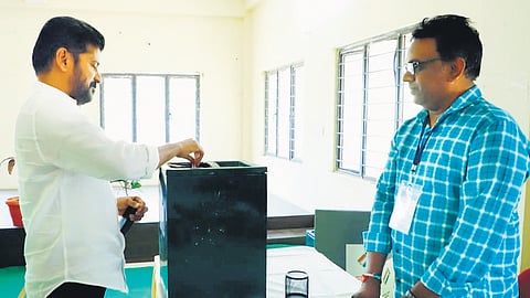 Chief Minister A Revanth Reddy casts his vote at the office of the Mandal Parishad Development Officer in Kodangal on Thursday
