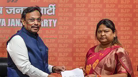 JMM legislator Sita Soren, the sister-in-law of former Jharkhand chief minister Hemant Soren, with BJP leader Vinod Tawde as she joins the party, in New Delhi, Tuesday, March 19, 2024.