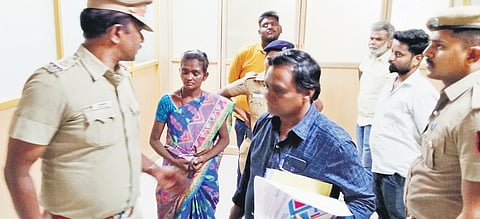 Manimekalai with officials at the Tiruppur corporation zonal office on Thursday