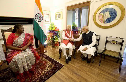 President Droupadi Murmu and PM Modi at L K Advani's residence.