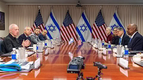 Israeli Defense Minister Yoav Gallant, at far left, speaks while meeting with Defense Secretary Lloyd Austin, across table at far right, at the Pentagon, Tuesday, March 26, 2024, in Washington.