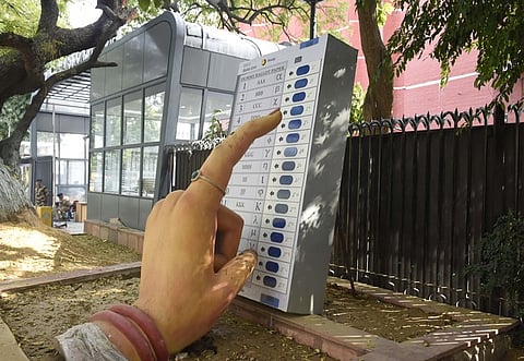 Replica of EVM stall outside at Election Commission of India ahead of Lok Sabha election in New Delhi.