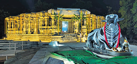 The rebuilt Kalyana Mandapam and Nandi statue at the Thousand Pillar temple in Hanamkonda are seen adorned with flowers and illuminated with lights