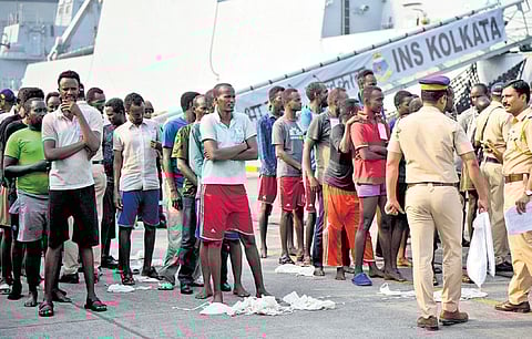 Pirates, apprehended by the Indian Navy in an operation off Somalia coast, being handed over to police after arrival in Mumbai on Saturday