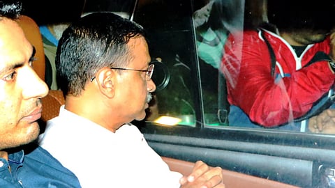 Delhi Chief Minister Arvind Kejriwal being taken to the Enforcement Directorate office in an excise policy-linked money laundering case on Thursday night
