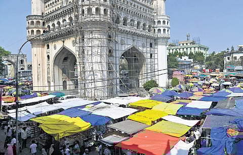 The temporary shelter arranged by vendors near Charminar to protect customers from the scorching heat in Hyderabad on Saturday
