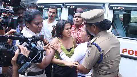 Police arrest KSU workers and contestants who protested during the Kerala University Arts Festival near University Senate Hall in Thiruvananthapuram.