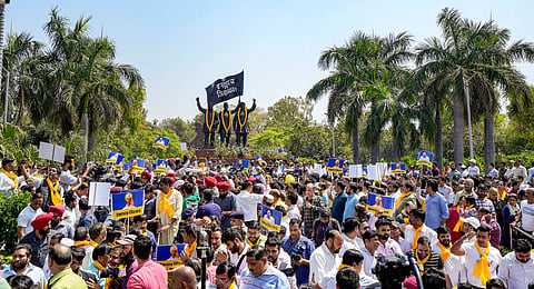 AAP workers and supporters at Shaheedi Park during a protest over the arrest of Delhi Chief Minister Arvind Kejriwal in connection with an excise policy-linked money-laundering case, in New Delhi, Saturday, March 23, 2024.