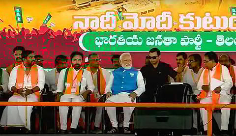 Prime Minister Narendra Modi with Union Minister and Telangana BJP President G. Kishan Reddy and others during a public meeting ahead of Lok Sabha elections, in Nagarkurnool, Telangana, Saturday, March 16, 2024.