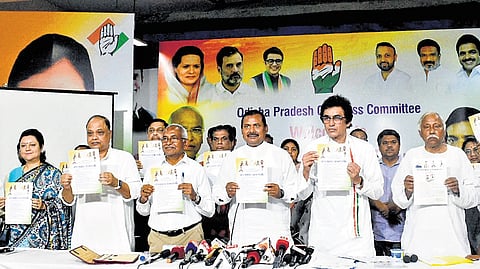 Congress state in-charge Ajoy Kumar, OPCC president Sarat Pattanayak and other senior leaders releasing the party’s manifesto in Bhubaneswar, on Friday