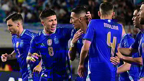 Argentina's forward Angel Di Maria (C) celebrates scoring his team's first goal with teammates during the international friendly football match between Argentina and Costa Rica on March 26, 2024.