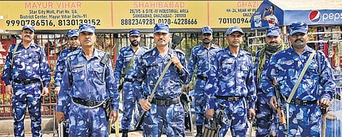 Police stand guard at Shaheen Bagh on Tuesday.