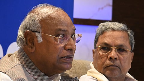 AICC President Mallikarjun Kharge with CM Siddaramaiah at a press meet in Bengaluru