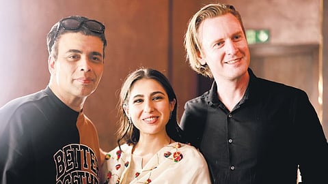 Alexx O'Nell with his 'Ae Watan Mere Watan' co-star Sara Ali Khan and director-producer Karan Johar