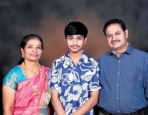 Bhuvan M with his parents