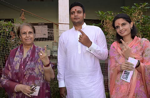 Mysuru Kodagu BJP candidate Yaduveer Krishnadatta Chamaraja Wadiyar, his mother Pramoda Devi Waidyar, and wife Trishika casting their vote