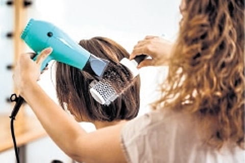 Keratin treatment, a popular method, promises frizz-free, smooth, and straight hair.