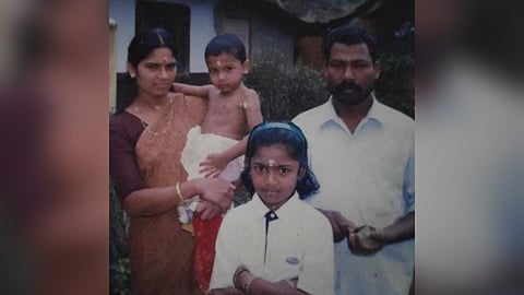 Sajana with her mother Sarada and father Sajeevan in her childhood.