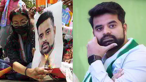 Protestors burn a poster of JD(S) MP Prajwal Revanna during a protest against his involvement in the alleged sexual abuse case.