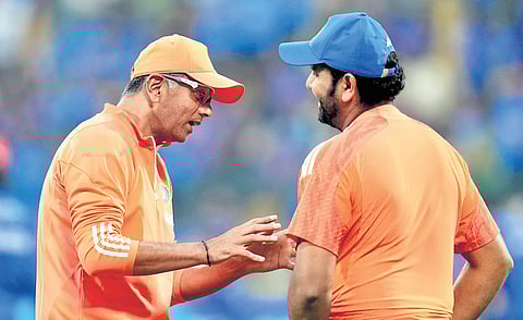 Rahul Dravid, head coach of India, with captain Rohit Sharma