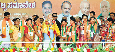 Prime Minister Narendra Modi takes part in an election campaign meet in Bagalkot on Monday | Express