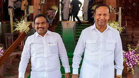 TR Baalu and A Raja at Parliament House during the special session in Delh