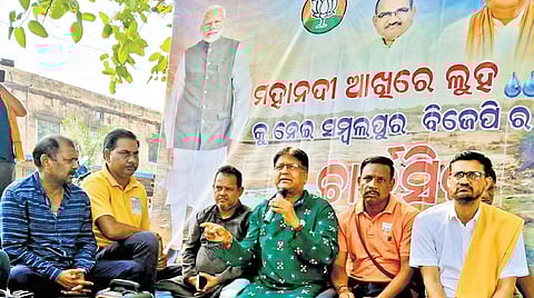 The BJP press meet by a Mahanadi ghat in Sambalpur on Saturday