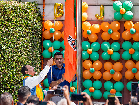 BJP President J P Nadda hoists the party flag on the party's foundation day at the BJP headquarters, in New Delhi, Saturday, April 6, 2024.