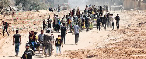 Palestinians return to Khan Yunis after Israel pulled its ground forces out of southern Gaza Strip on Sunday | afp