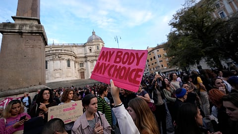 People stage a protest on 'International Safe Abortion Day' to ask for more guarantees on the enforcement of the abortion law that they claim is seriously endangered by the high rate of doctors' conscientious objection in the country, in Rome, Wednesday, Sept. 28, 2022.
